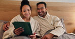 Night, couple and talk in bedroom with tablet, browsing social media and website for bonding together. Late, happy married people and relax in home with tech, conversation and online entertainment.