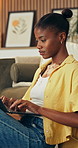 Happy, student and black woman on laptop in home for remote learning, application and online course. Apartment, college and person on computer for studying, education and research for assignment