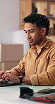 Shipping, man and typing on laptop in startup for logistics dispatch, process invoice or export. Supply chain, small business owner and tech for booking load, check delivery status and filing claims