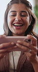 Laughing, streaming and woman on sofa with phone, online subscription and watching movies. Home, happy and person with earphones, mobile app and humor for videos, comedy film and series on weekend