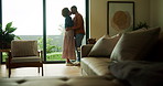 Kiss, dancing and couple in home for love, bonding and romantic moment on weekend together. Marriage, happy and black man and woman with music, embrace and affection for relationship, care and trust