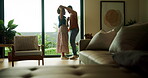 Couple, dance and holding hands in lounge, love and bonding with partner on anniversary and spinning. Black people, home and forehead touch with spouse, rhythm and happy for relationship milestone