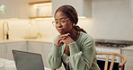 Woman, glasses and remote work in house with laptop, thinking and reading proposal for blog post. Black person, browsing and freelance writer in home with computer, planning and article for website.