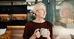 Window, thinking and mature woman with coffee in home for nostalgia, past memory or reflection. Thoughtful, female person or drinking with mug or glass for vision, ambition or starting day in house