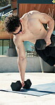 Dumbbells, exercise and summer with man outdoor for health, training or workout routine. Fitness, strength and weightlifting with shirtless person on concrete porch of home for bodybuilding session