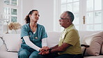 Holding hands, caregiver and senior man for support, empathy and advice at consultation or visit. Happy nurse, assisted living and old person with kindness, communication or care in retirement home