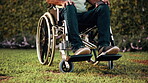 Healthcare, man or legs outdoor with wheelchair, mobility impairment or transport in stroke recovery. Wellness, chair or person with disability, spinal injury or movement aid in rehabilitation.