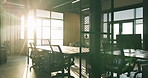 Office, equipment and chairs with empty space for company startup or business operations. Technology, computer or lens flare in workplace for career development or job opportunity in work building