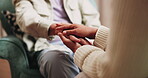 Holding hands, senior and person with empathy on home sofa for care, love or visit from daughter. Touch, together and elderly patient with dementia, kindness and communication for healing or support