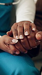 Caregiver, holding hands and person at house with comfort, compassion and empathy for diagnosis. Nurse, consoling or patient with depression, emotional support and understanding for medical treatment