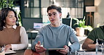 Man, team and tablet for conversation in office with meeting, proposal or review at real estate agency. People, realtor and consultant with tech for investor, property development or budget insight