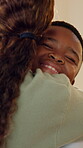 Support, mother or son in house with hug, security or bonding together in loving connection. Comfort, childcare or black family with trust, caring moment or parent embrace in healthy relationship.