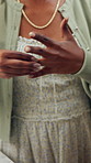 Wedding ring, hands and woman in home for conflict, fight and relationship crisis for divorce. Marriage, couple and frustrated person with jewelry for argument, separation and commitment mistake