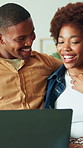 Couple, laugh and watching movie in house with laptop, bonding together and humor for comedy show. Married, black people and relax in living room with computer, happy and streaming funny film.
