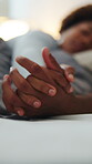 Love, rest or couple on bed with holding hands, partner trust or bonding together on weekend break. Relax, space or people in house with affection, romantic moment or day off in healthy relationship.