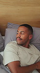 Sleeping, relax and black couple in bed at house with disappointment, upset or argument in morning. Tired, cuddle and man with woman in bedroom for fatigue, mad or exhaustion in home on weekend.