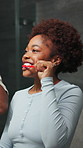 Woman, brushing teeth and couple in bathroom, oral hygiene and morning routine with partner in home. Black people, grooming and dental care with spouse in house, happy and clean mouth with toothpaste
