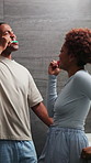 Couple, laugh and brushing teeth in bathroom, clean and happy with partner in house or oral hygiene. Black people, grooming and bonding with spouse in home, morning routine and dental care for mouth