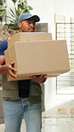 Boxes, walking and black man with door delivery for shipping, logistics or transportation. Male person, package or parcel with online order for courier service, distribution or supply chain in home