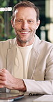 Smile, professional and face of businessman in office with confidence for finance career. Happy, about us and portrait of mature financial manager with pride for corporate job opportunity at agency.