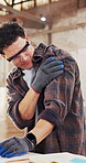 Carpentry, stress and man with arm pain from muscle fatigue, manual labor and repetitive strain. pressure, carpenter and massage shoulder ache with discomfort, woodworking accident and injury on duty