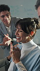 Applause, laptop and businesswoman with team in office with good news on investment approval. Clapping hands, computer and financial advisors with manager for positive feedback on finance revenue.