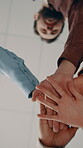 Hands, stack and celebration with team in office, achievement or motivation for marketing assignment. People, collaboration and solidarity with colleagues, low angle and success in advertising agency