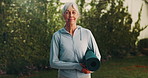 Yoga mat, fitness and face of senior woman in nature with confidence for exercise, health or wellness. Morning, happy and portrait of elderly person with equipment for pilates, calm or relax in park.