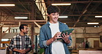 Tablet, carpenter and man in workshop for woodwork, smile and walking with team for review. Tech, joinery production and happy person with manufacturing app, craft design and project update