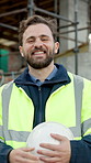 Face, engineer and man at construction site with smile, urban development or remodeling. Portrait, happy person and employee for architecture, pride and infrastructure for safety and quality control
