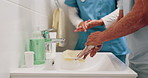 Bathroom, caregiver and senior man for washing hands, cleaning and hygiene for morning routine. Nursing home, assistance and nurse with elderly person for help with health, cleanse and wellness