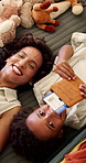 Bed, face and passport of boy with mother in hotel room for holiday, travel or vacation. Above, boarding pass and smile of son with single parent woman in bedroom at accommodation for bonding