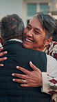 Hug, outdoor and mature couple with love, care and reunited in home frontyard with smile. Happy, embrace and healthy marriage of man and woman together at house for commitment, connection or wellness
