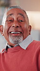 Face, senior and happy man laughing in home with pride for humor, comedy or retirement. Portrait, elderly or male person with smile or positive attitude for pension, holiday or weekend in house