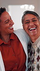 Face, mother and adult daughter with hug for bonding together, smile or wellness on weekend in home. Bokeh, flare or happy senior mom in living room with woman, embrace or love for family connection.
