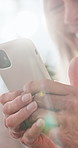 Hands, typing and elderly woman with phone, laughing and communication with contact on social media. Message, flare and senior person with mobile, internet connection and happy with technology