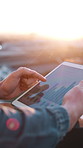 City, hands and business person on tablet for financial report, profit growth and stock statistics. Balcony, online and worker on tech, screen and chart for research, finance review or investment