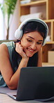 Headphones, laptop and smile with woman on floor in home for video tutorial of yoga. Computer, fitness and streaming with happy person in apartment for health activity, online class or wellness