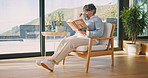 Coffee, home and senior woman reading book for houseplant, relax and plant research in lounge. Elderly person, tips or guidebook info for knowledge development with tea and calm retirement in house