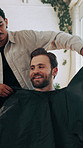 Apron, barbershop and done with men in small business for appointment, change or maintenance. Finish, hairdressing and stylist speaking to happy customer in chair for grooming, hygiene or service