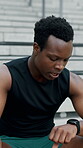 Smart watch, fitness and tired with black man on steps for workout break, tracking heart rate and check. Health app, exercise rest and breathing with person outdoor for runner performance and stats