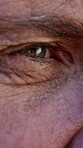 Old man, eye and closeup for optical health, myopia and visual sight with eyecare or glaucoma. Face, eyesight and senior person for ocular wellness, cataract and optometry with cornea perception