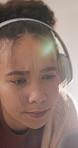 Confused, woman and headphones in home with laptop, website glitch and problem for streaming music. Flare, person and doubt in house with computer, audio tech and connectivity issue for online radio.
