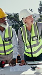 Discussion, team and engineer with floor plan outdoor for construction, site development and project. Collaboration, architect and mature people with blueprint document, point and review design