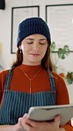 Walking, tablet and woman in coffee shop for online menu, inventory checklist and digital orders. Restaurant, typing and person on tech for cafe website, review and stock for hospitality service