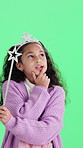 Thinking, princess and girl in studio with green screen for ideas, pretend and imagination. Childhood, wondering and child with wand, crown and toy for fun, games and fantasy on chromakey background