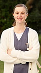 Face, woman and caregiver in nature with smile, career pride and about us for medical assistance. Portrait, female person or nurse in backyard with arms crossed, positive attitude and assisted living