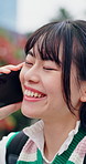 Phone call, laugh or college student in town with connection, funny chat or online joke on commute. Happy, digital or Asian woman with tech, university contact or humor communication in urban travel.
