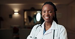 Black woman, doctor and face in hospital for healthcare, confidence and happy for night service. Specialist, smile and portrait in facility for about us, wellness representative and overtime for care