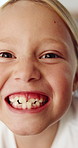 Face, child and smile at house with teeth, cavity and dental neglect for poor oral hygiene. Portrait, girl and happy kid in home with tooth decay, plaque buildup and symptoms of gingivitis disease